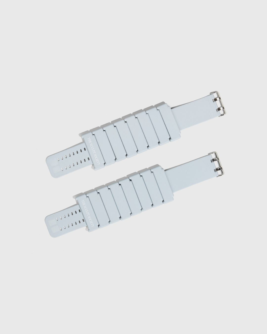 TSS 1 lb ankle weights with buckle closure laying flat (horizontal) light blue