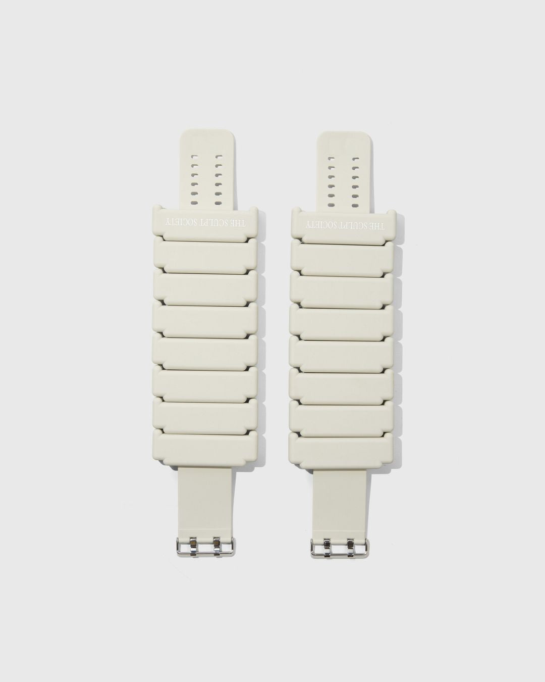 TSS ankle 2lb weights with buckle closure laying flat off white