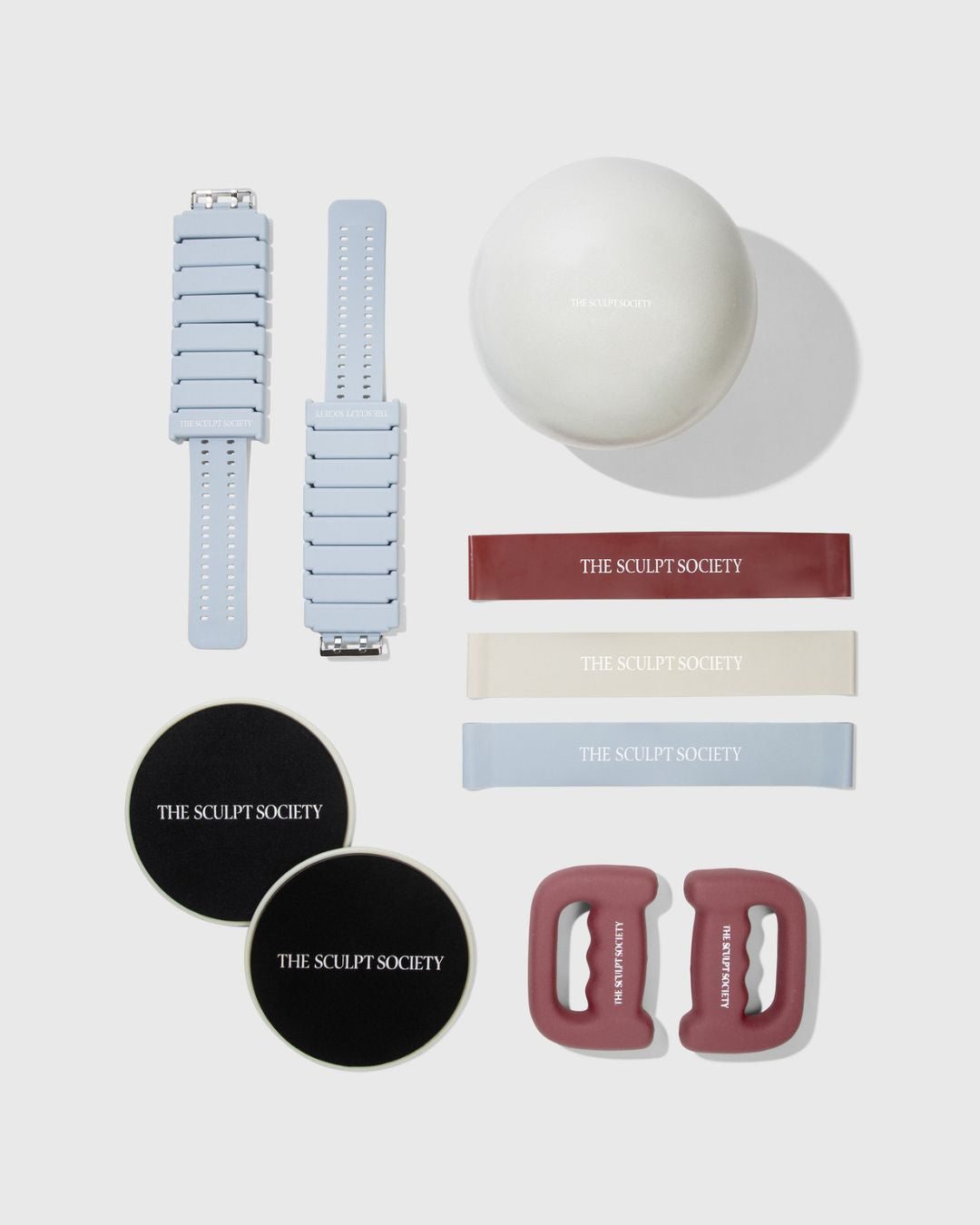 All You Need Equipment Bundle featuring 1 lb ankle weights, pilates ball, bands, sliders, and 3 lb handweights