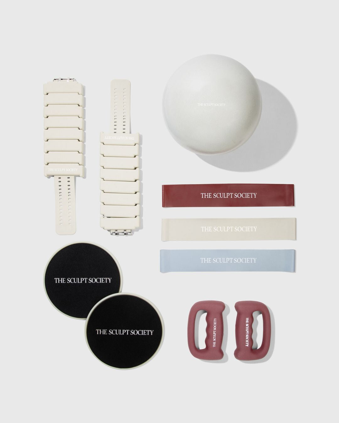 All You Need Equipment Bundle featuring 2 lb ankle weights, pilates ball, bands, sliders, and 2 lb handweights