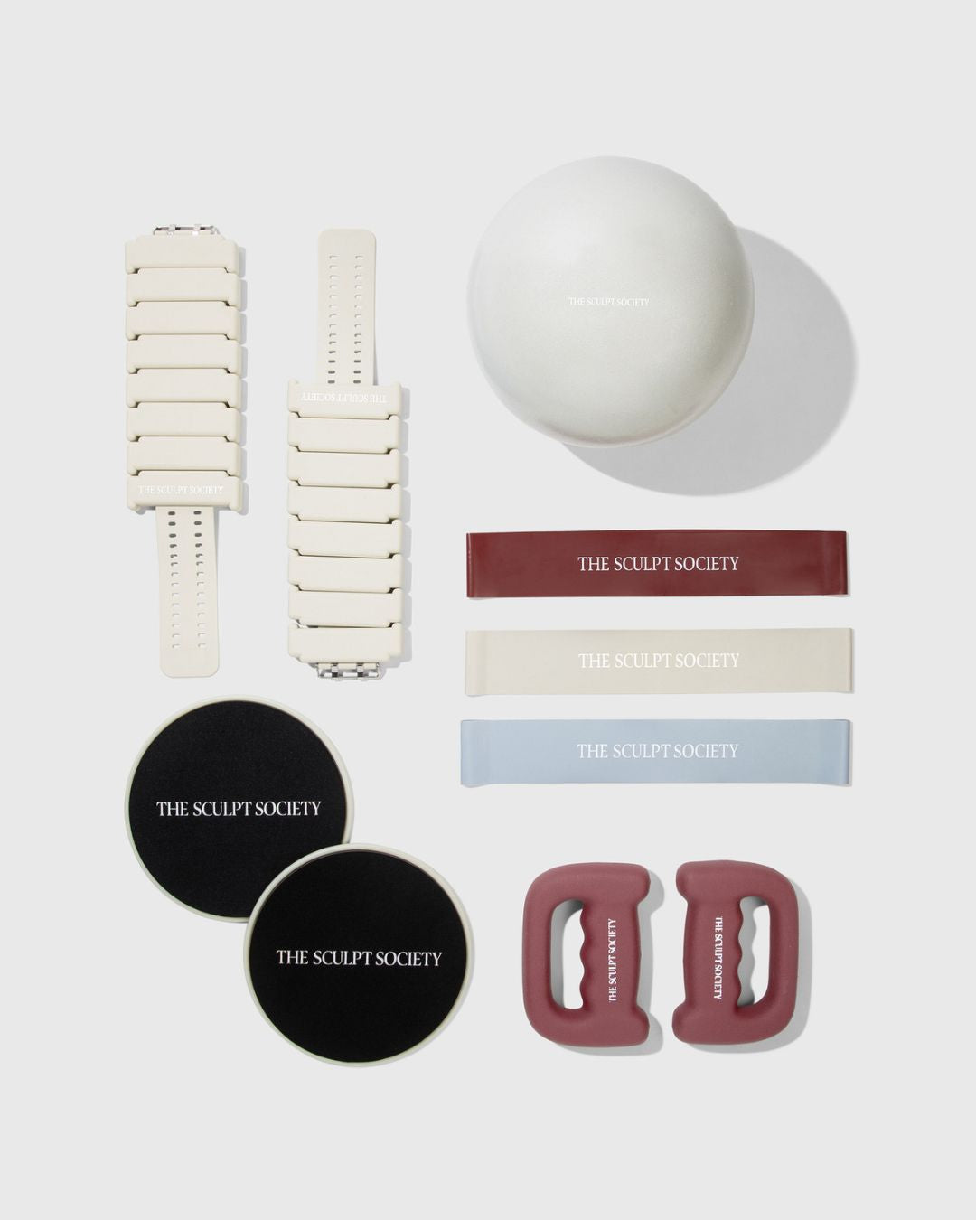 All You Need Equipment Bundle featuring 2 lb ankle weights, pilates ball, bands, sliders, and 3 lb handweights